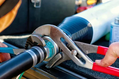 Pipe repair service using professional plumbing tools in Peachtree Corners, Georgia